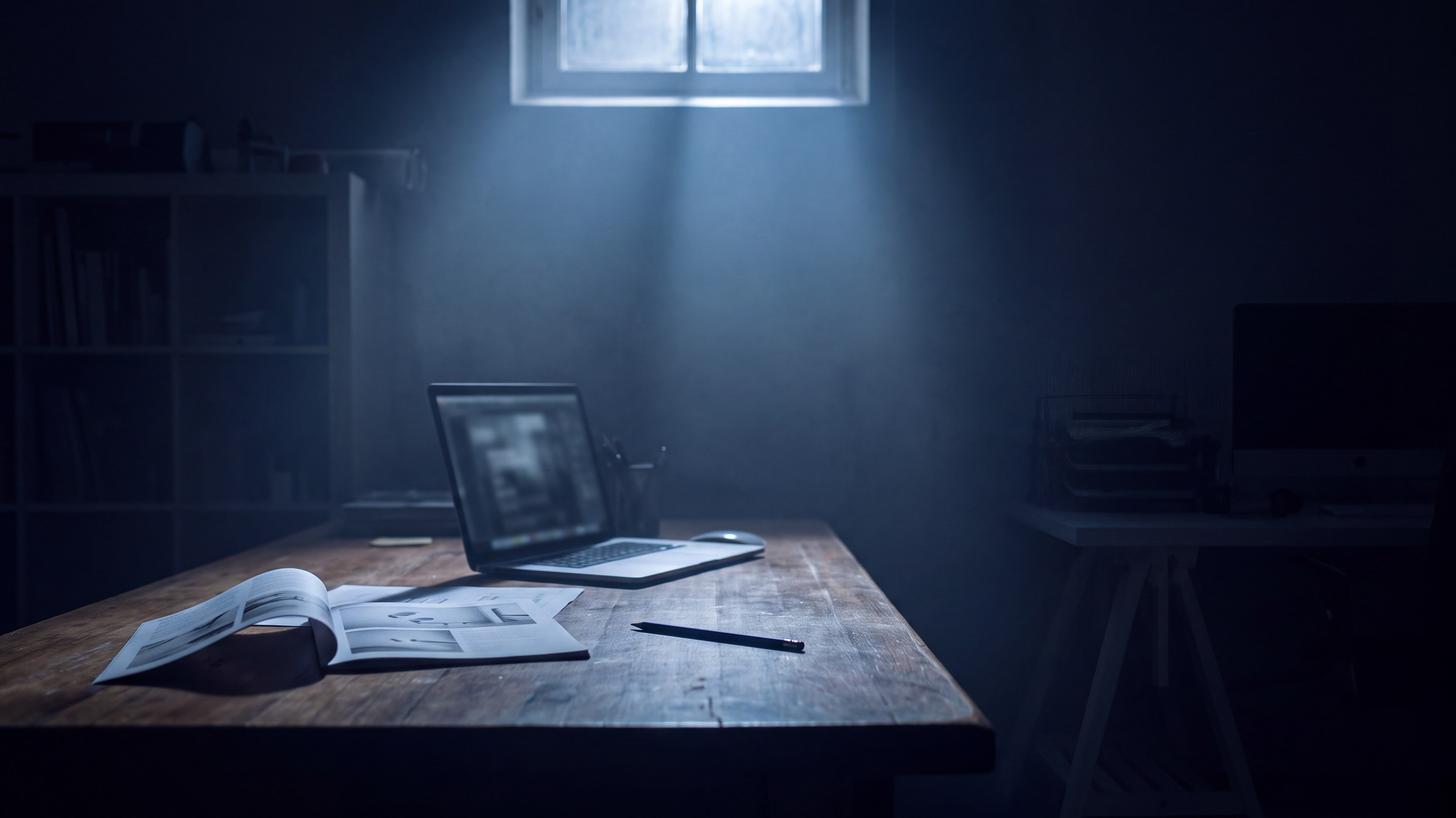 A beam of light passing through a glass grid in fog